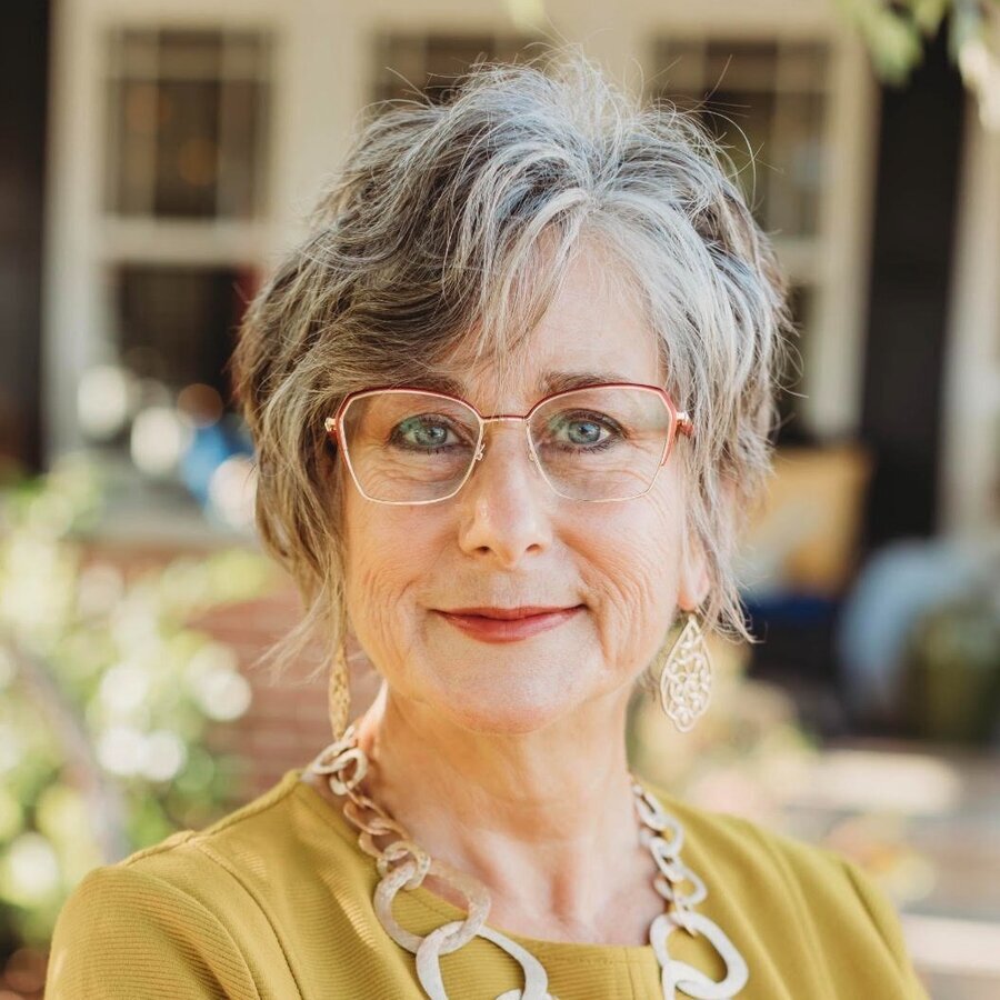 Necia T Freeman, GRI, ABR